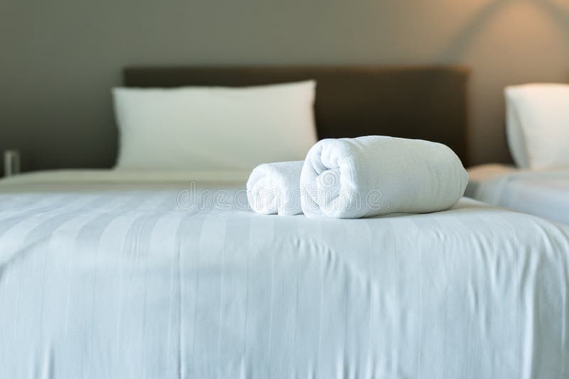 White Hotel Towel on Bed,Stack of Fluffy Bath Towels,Close Up,Copy