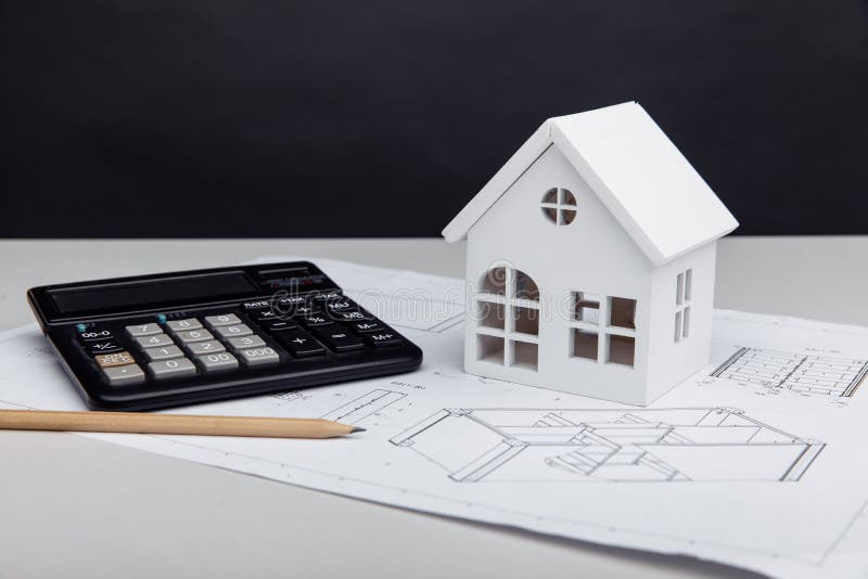 White House and Calculator on Drawing. House Building Estimate Concept