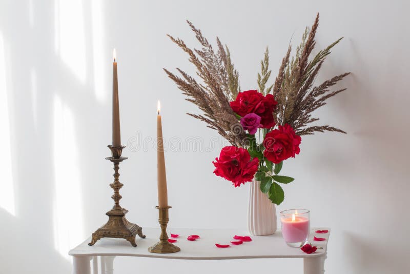 Interior with Bouquet of Roses and Burning Candles Stock Image Image