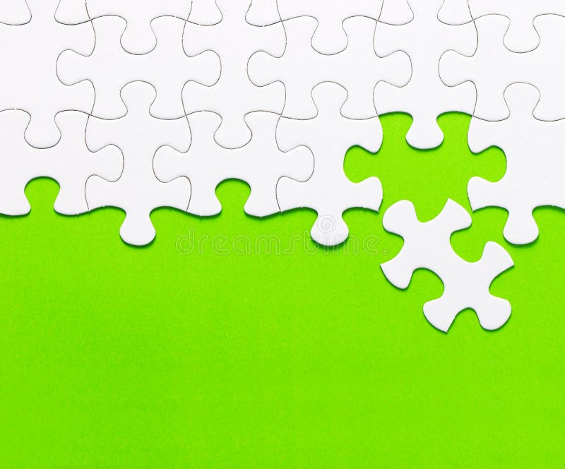 White Jigsaw Puzzle on Green Background Stock Image Image of