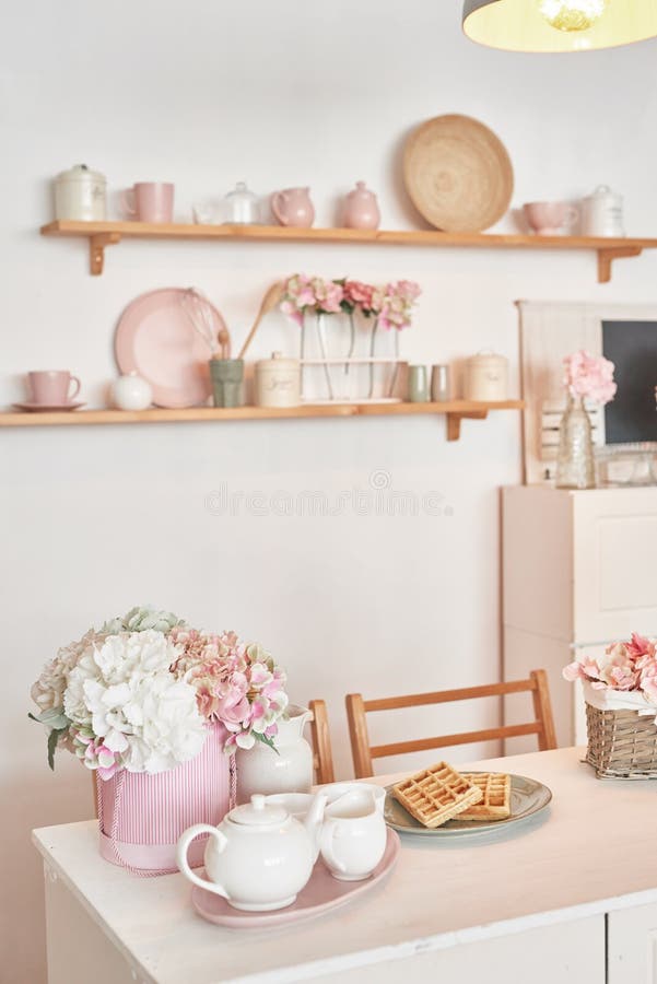 White Kitchen Interior. Crockery and Kitchen Utensils Stock Image
