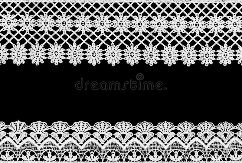 White lace on the black background