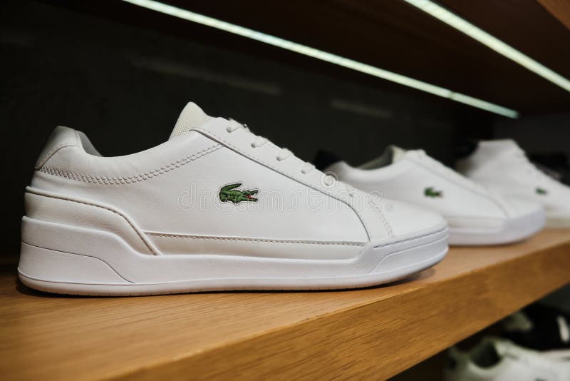 White Lacoste Challenge Sneakers at Shelf of - November Editorial Photo - Image of foot, footwear: 203622526