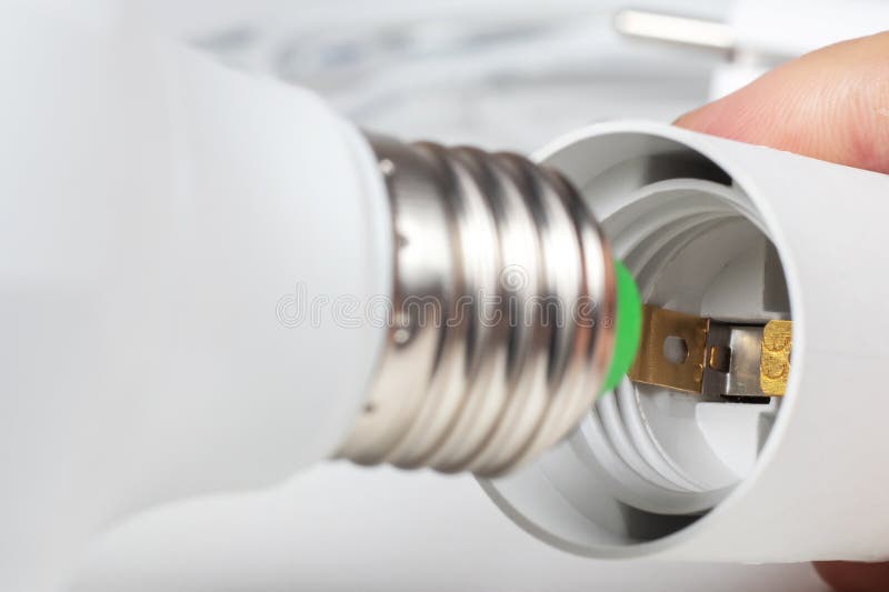 White lamp socket and lamp bulb, Electric cartridge for light bulbs, lamp holder, light fitting stock image