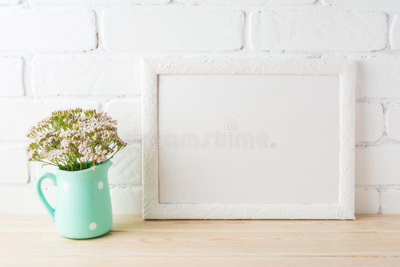 White landscape frame mockup with soft pink flowers in pitcher