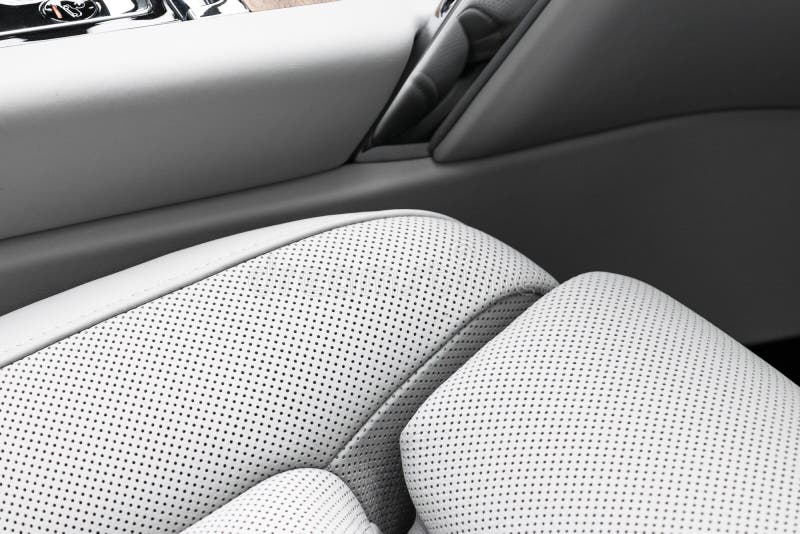 White Leather Interior of the Luxury Modern Car. Perforated White