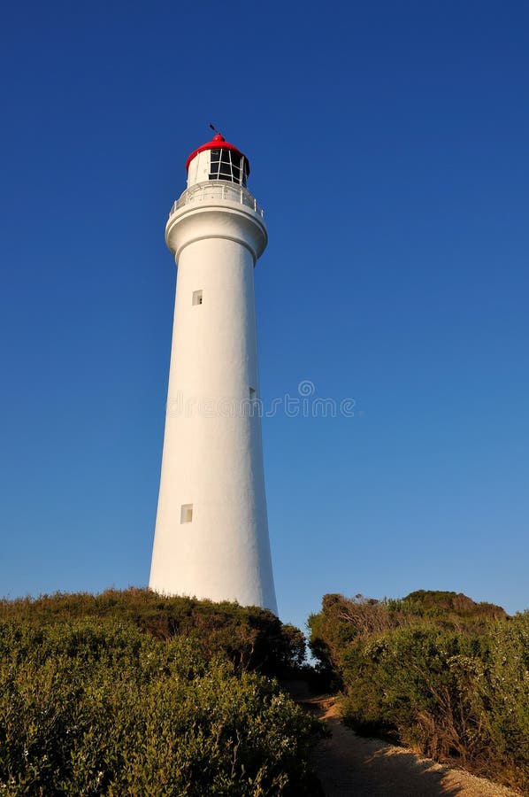 White lighthouse on the Great Ocean Road stock images