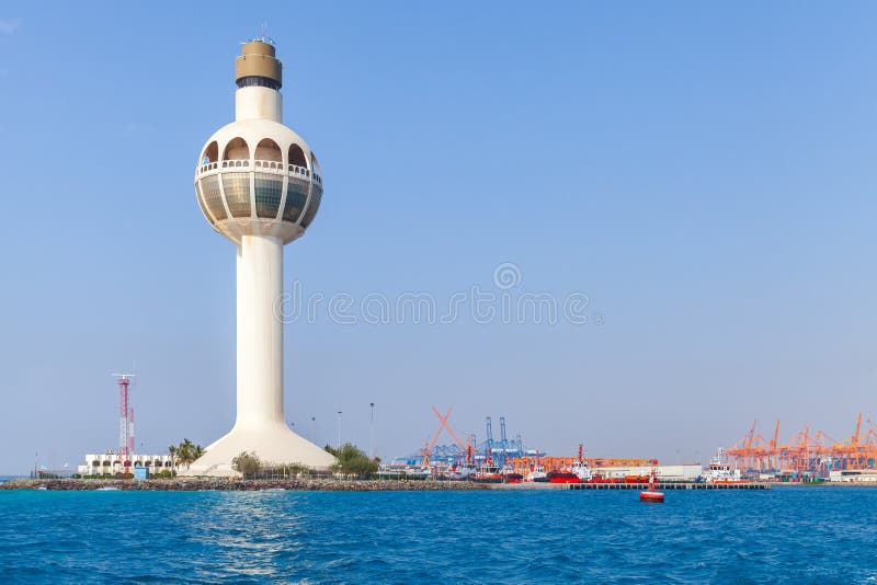 White lighthouse and traffic control tower. Jeddah, Saudi Arabia