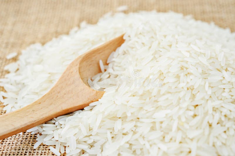 White long uncooked rice. stock image. Image of cereal 77464125