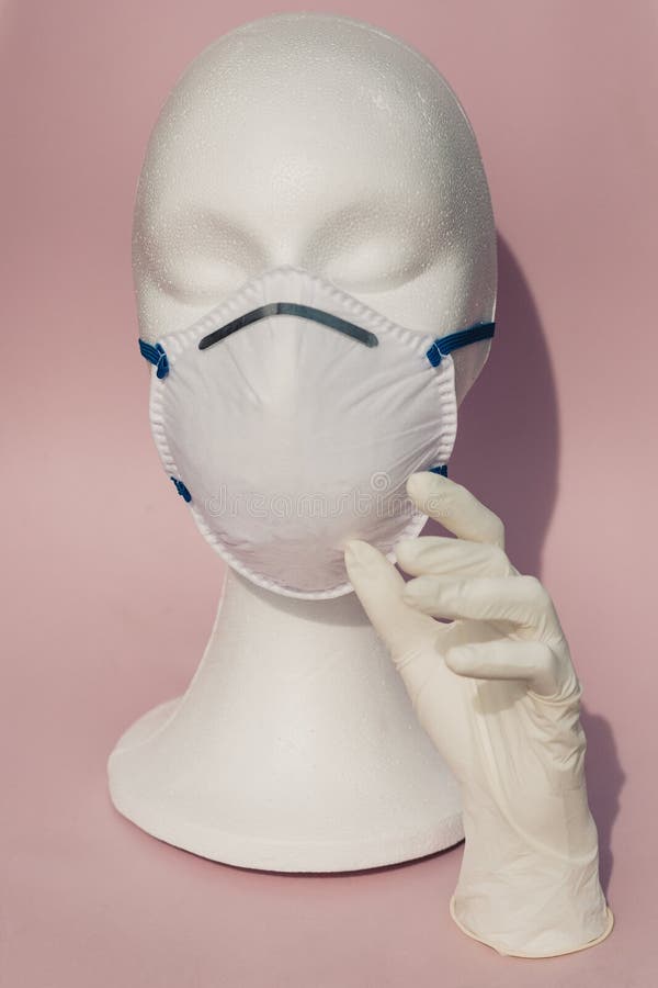 White Mannequin Head Wearing a Medical Mask - the Concert of ...