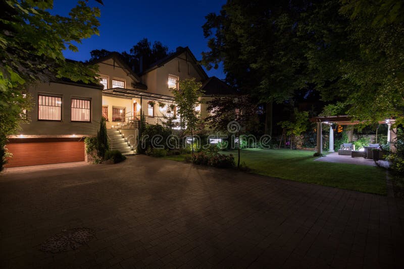 White mansion with cobbled driveway royalty free stock image