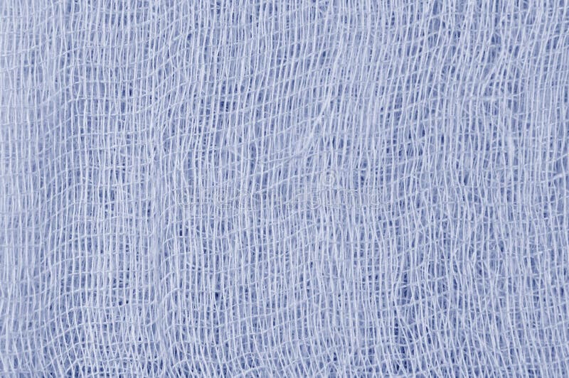 White medical bandage gauze texture, abstract textured background macro closeup, natural cotton linen fabric pattern, horizontal stock image White medical bandage gauze texture, abstract textured background macro closeup, natural cotton linen fabric pattern, horizontal stock image
