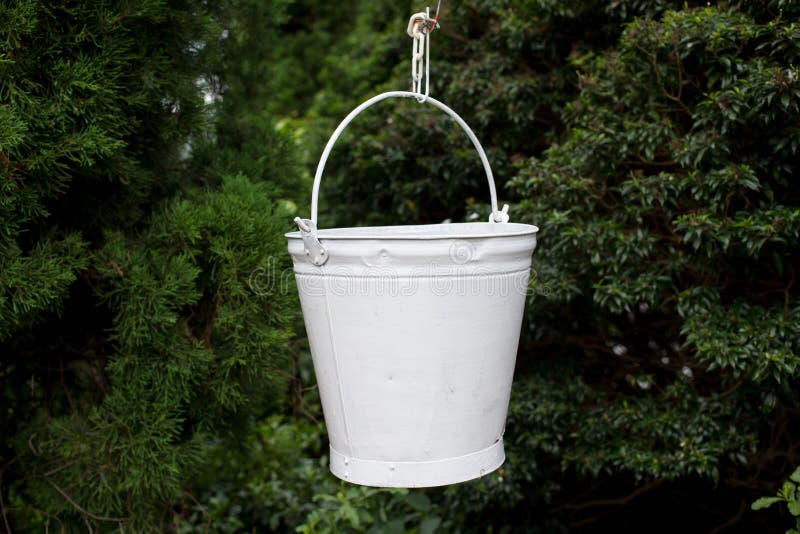 Old water bucket stock image. Image of silver, hang 103667869