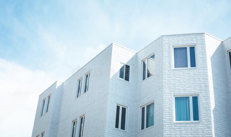 White minimal building apartment with sky royalty free stock image