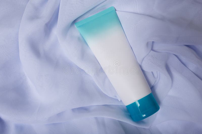 Download White Mockup Tube With Blue Cap, No Label On White Fabric, With Natural Solid Shadows. Template ...