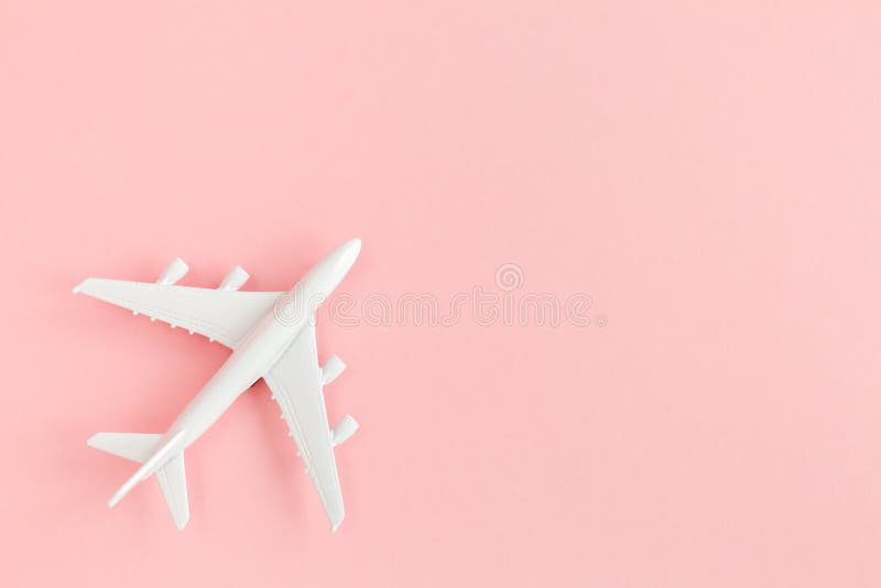 Premium Photo Toy plane and bus on orange background