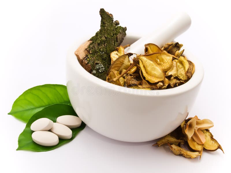 White mortar and pestle. Herbals, pills and green leaves. Green herbal drug medicine stock images, royalty-free photos and pictures