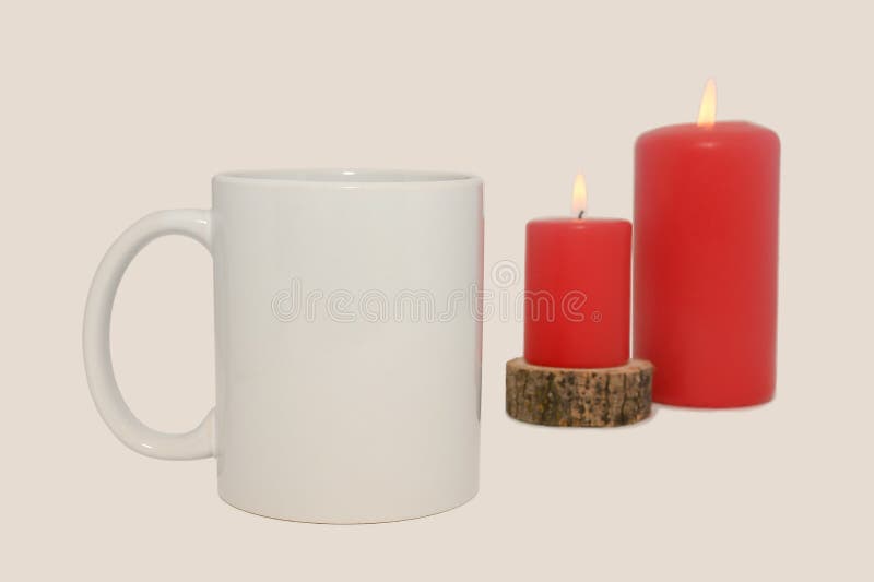 White mug mockup with candles. On a gray background. Close-up.