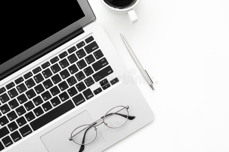 White office desk table with laptop computer and office supplies. Top view with copy space, flat lay royalty free stock photography