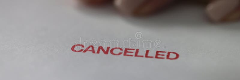 White paper with word Cancelled under banking terminal stock images
