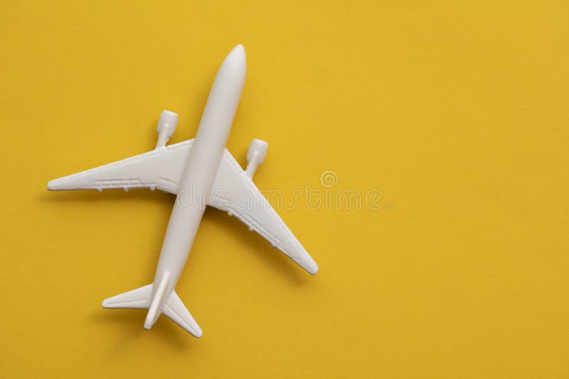 White Passenger Airplane on a Summer Yellow Background. Travel and Vacation Background Stock Image - Image of adventure, plane: 229486609 White Passenger Airplane on a Summer Yellow Background. Travel and Vacation Background Stock Image - Image of adventure, plane: 229486609