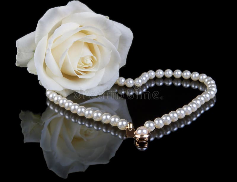 White pearls and rose stock image. Image of greetings 1739909