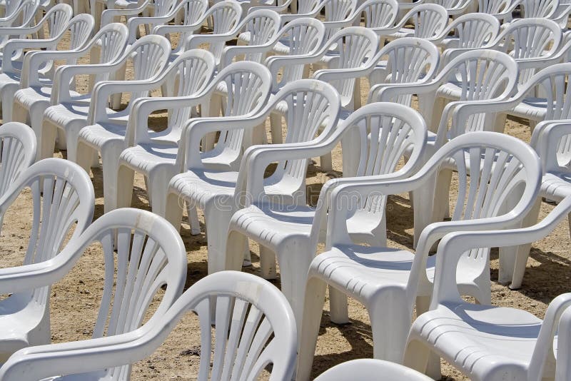 White plastic chairs stock photo. Image of 23802956