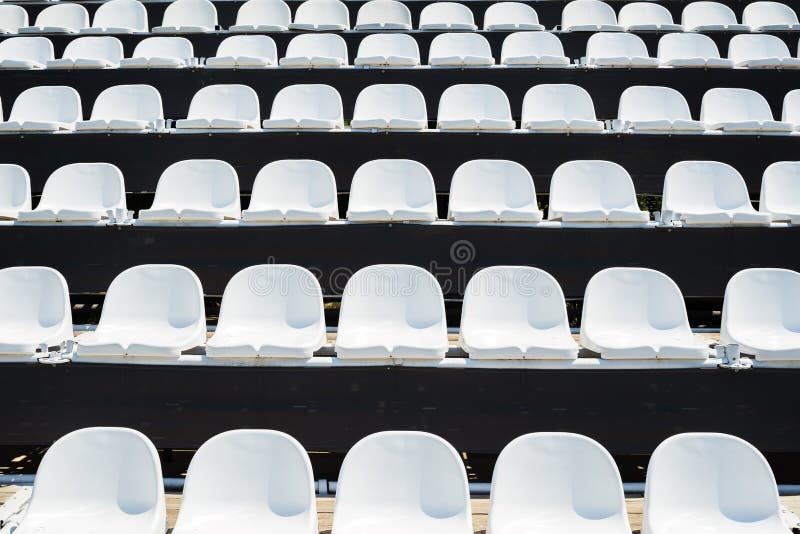 White Plastic Chairs at Stadium. Stock Photo Image of arena, ready