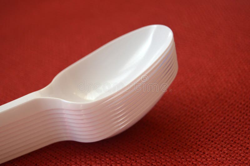 White plastic spoons stock image. Image of blue, cooking 37617969