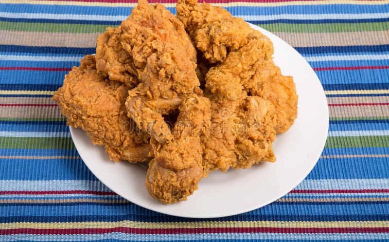 White Plate of Fried Chicken on Striped Towel Stock Photo - Image of ...