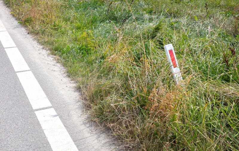 White Pole with Red Reflector at the Side of the Road Stock Image Image of success, reflector