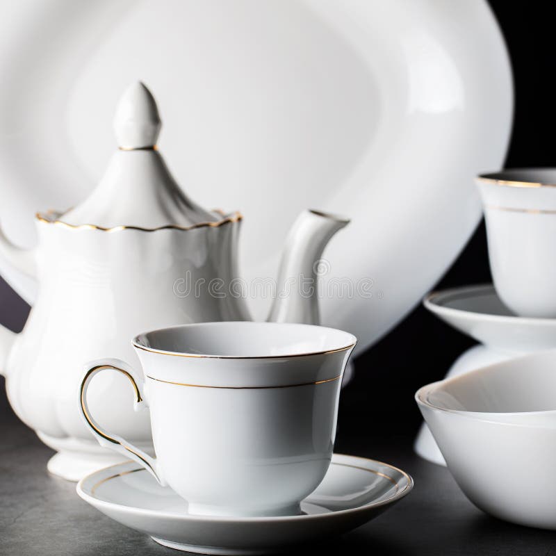 White Porcelain Tea Setfolded Cups And Saucers And Teapot Stock Image Image of kitchen