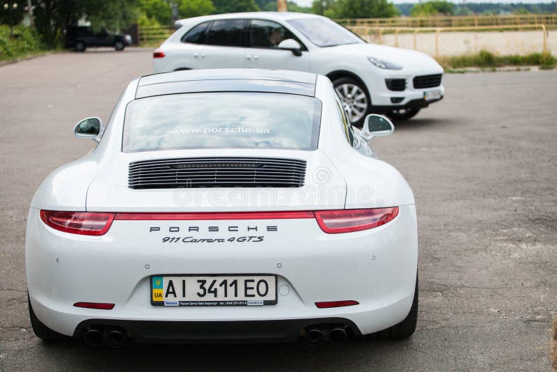 Porsche 911 Carrera 4 GTS in White. Editorial Stock Photo - Image of  expensive, pavement: 165485418