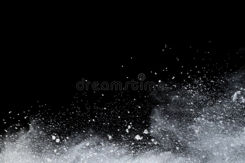 White powder explosion on black background. royalty free stock images