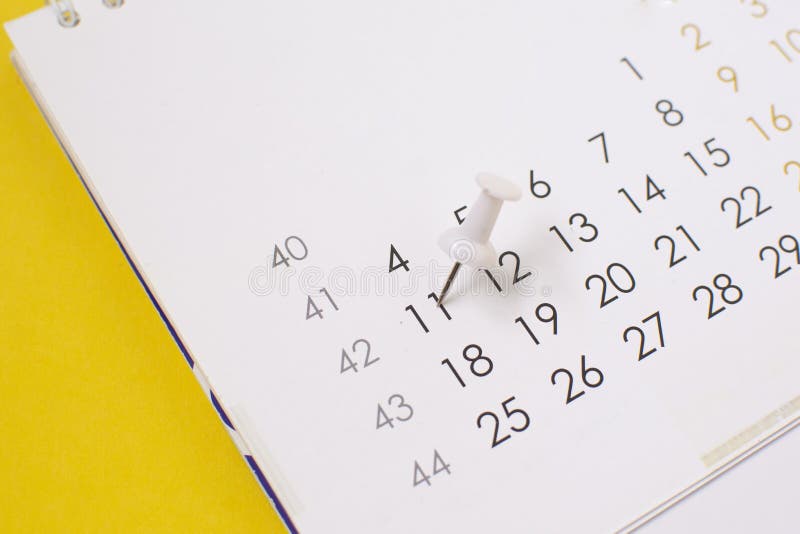A White Push Pin on the Calendar. Appointments Conception Stock Image
