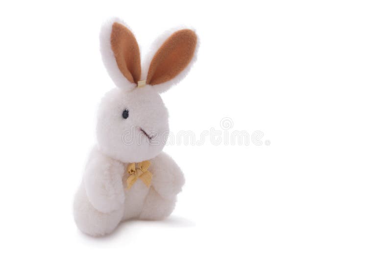 White rabbit toy doll isolated over white.