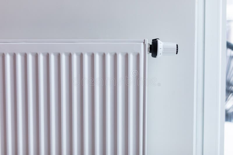 White Radiator with Temperature Control Valve. Central Heating Battery Stock Photo Image of