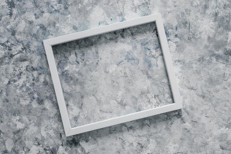 White rectangular picture frame mock-up with copy space for yout text or image on top of grey blue background royalty free stock image White rectangular picture frame mock-up with copy space for yout text or image on top of grey blue background royalty free stock image