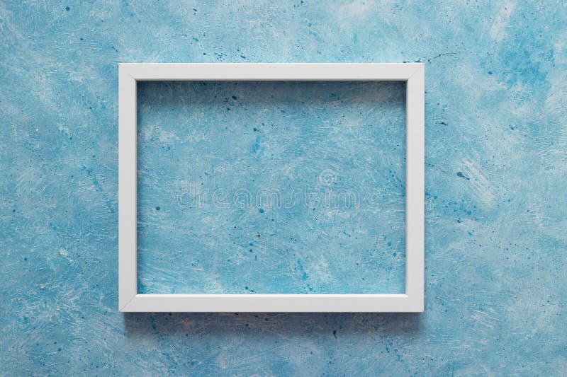 White rectangular picture frame mock-up with copy space for yout text or image on top of light blue background royalty free stock photo White rectangular picture frame mock-up with copy space for yout text or image on top of light blue background royalty free stock photo