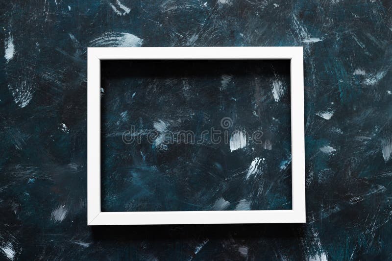 White rectangular picture frame mock-up with copy space for yout text or image on top of navy blue background stock images White rectangular picture frame mock-up with copy space for yout text or image on top of navy blue background stock images