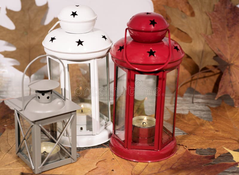 White and Red Candle Lantern with Autumn Leaves. Stock Image Image of