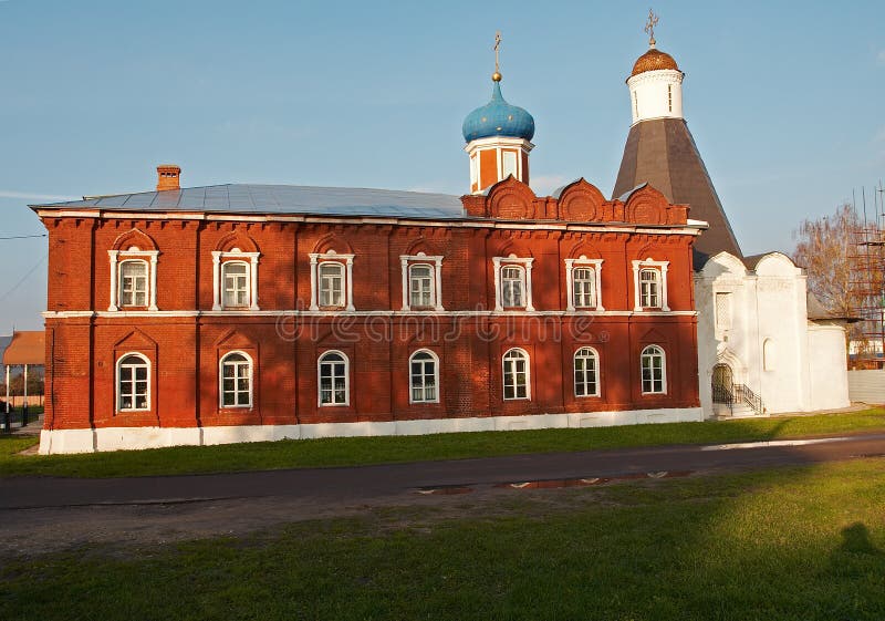 White and red masonry churches