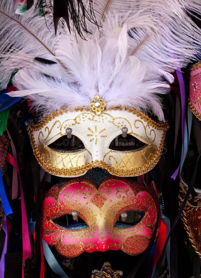 White Red Venetian Masks White Feathers Ribbons Venice Italy Used since the 1200s for Carnival, which were celebrated just before Lent. In ancient times, Masks allowed the Venetians to do what was illegal, such as gambling. White Red Venetian Masks White Feathers Ribbons Venice Italy Used since the 1200s for Carnival, which were celebrated just before Lent. In ancient times, Masks allowed the Venetians to do what was illegal, such as gambling.