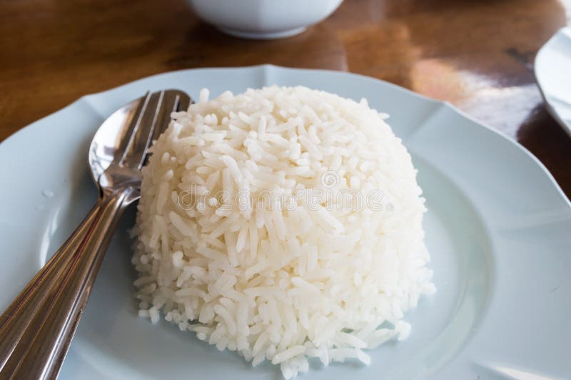White rice in dish stock image. Image of blue, background 54973289