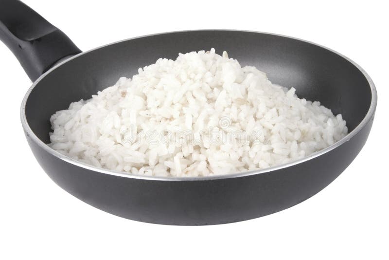 White rice on fry pan stock image. Image of fiber, meal 10351449