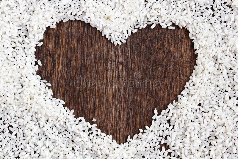 White Rice Scattered in the Shape of Heart Stock Photo Image of