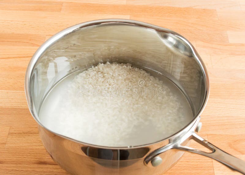 White Rice in Water in a Ladle Stock Photo Image of food, ladle
