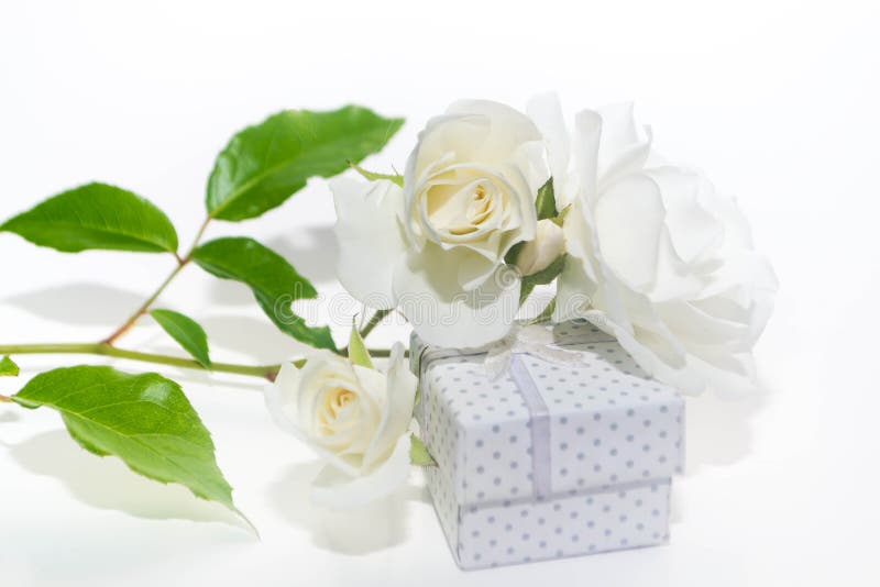 White roses and gifts stock photo. Image of passion 154406724