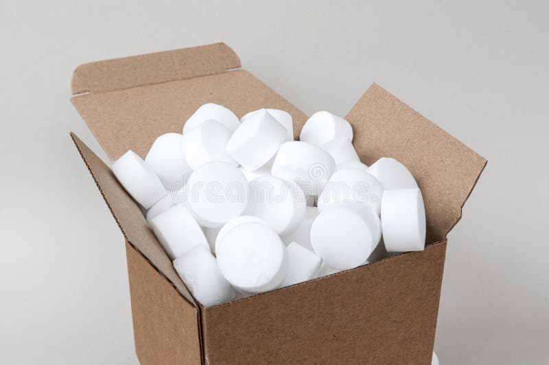 White Round Dishwasher Salt Tablets in a Box. Set of White Capsules