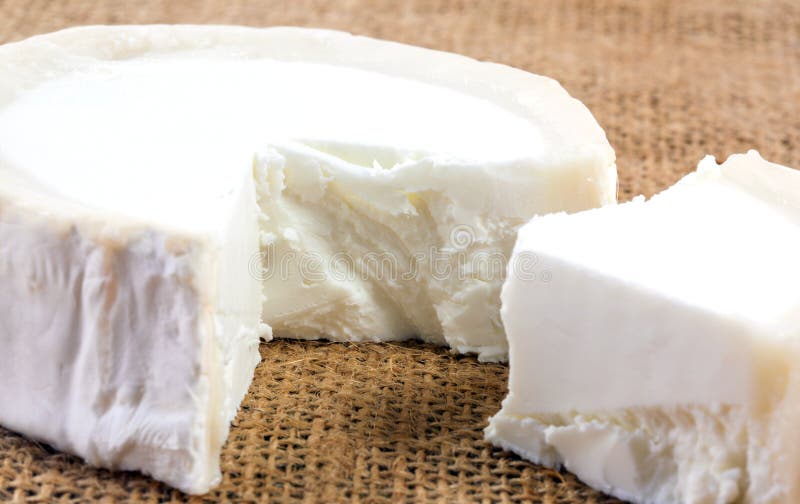 Closeup of Fresh French Goat`s Cheese. Stock Photo - Image of piece ...